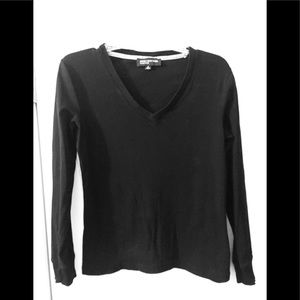 Black long sleeved v neck top. Make an offer